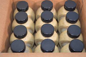 lot 74 image: 12-Pack Emerils Kicked Up Horseradish Mustard 12oz Bottles Best By 42023