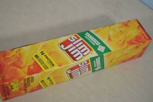 lot 38 image: Box of Slim Jim Meat Sticks Tabasco Seasoned