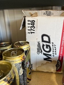 lot 35 image: 6 cans  MGD Draft 24oz with box