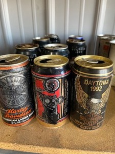 lot 38 image: 9 cans different cans of collectable cans of beer some opened some not
