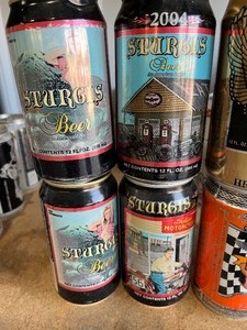 lot 42 image: 8 cans many different years of Sturgis  collectable beer