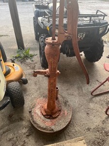 lot 88 image: Vintage Pump on concrete base