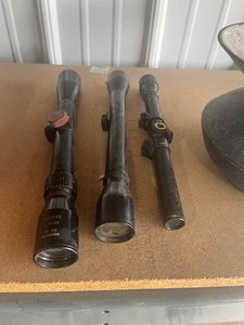 lot 14 image: old wood box with old scopes and misc