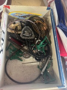 lot 22 image: Cigar box with misc bell coke bottle opener  a bunch of flags