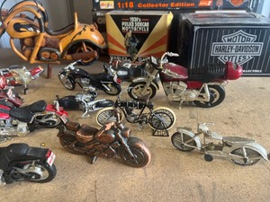 lot 56 image: Collection of small Hartley Davidson Bikes  some boxes