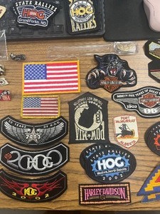 lot 54 image: Bag of Patches and Pins   Harley Davidson