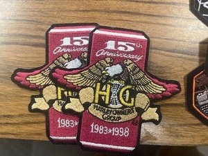lot 55 image: Bag of Patches and Pins   Harley Davidson