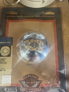 lot 50 image: Harley Davidson clock  ashtray  key chain  Gas Cap Medallion