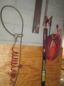 lot 366 image: Extension cord, jumper cables, leve...