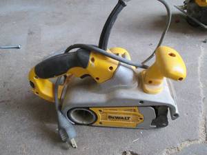 lot 397 image: Dewalt electric belt sander...