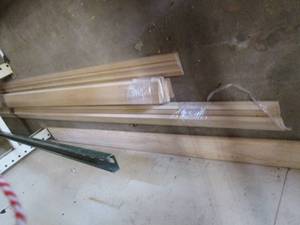 lot 418 image: Assortment of wood trim boards and ...