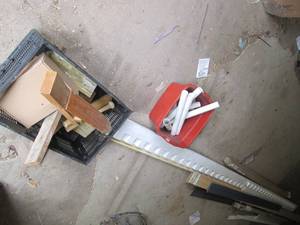 lot 421 image: Stack of wood trim board, crate of ...