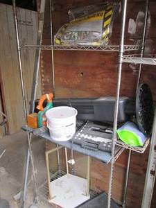 lot 429 image: Rolling wire metal shelf with conte...