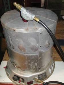 lot 874 image: Propane cylinder style Heater...