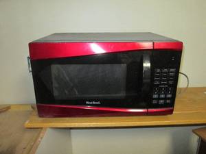 lot 514 image: West Bend Red and Black Microwave...