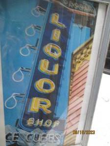 lot 195 image: Vintage Liquor Store Sign...