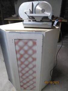 lot 204 image: Cabelas Meat Slicer & Wood Cabinet
