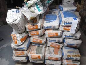 lot 235 image: Concrete Mix 60 pound bags...