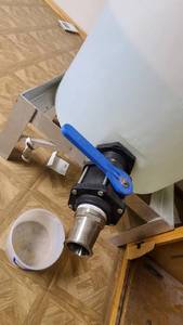 lot 199 image: 150 Gallon Poly Tank wValve and Aluminum Stand