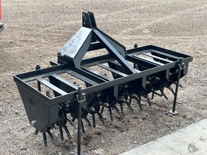 lot 4 image: NorTrac Three-Point Lawn Aerator