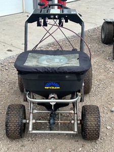 lot 1 image: Stryker Stand-On Broadcast Spreader