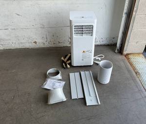 lot 134 image: GE 8,000 BTU Portable Air Conditioner - White