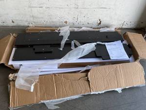 lot 140 image: Fezibo 55 x 26 inch Electric Standing Desk - Black with Walnut Top