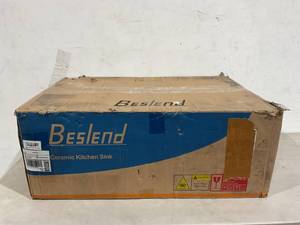 lot 67 image: Besland 33 Inch Double Bowl White Farmhouse Sink with Bottom Grids