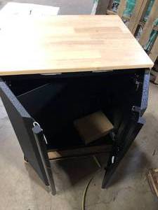 lot 1 image: Husky Pro Duty Welded 20-Gauge Steel 2-Door Garage Base Cabinet in Black LINE-X (28 in. W x 33 in. H x 21.5 in. D) Damaged Customer Returns See Pictures