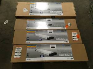 lot 42 image: Lot of 4 Commercial Electric Moroccan 48 in. x 10 in. Dark Bronze CCT Selectable LED Flush Mount Ceiling Light 4000 Dimmable Lumens customer return review pictures