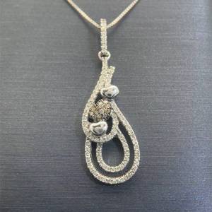 lot 49 image: Diamond Three-Heart Halo Ribbon Drop Pendant in White Gold $900 Retail