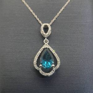 lot 30 image: Natural London Blue Topaz & Diamond Halo Vintage Style Pendant Necklace in White Gold $1,550 Retail