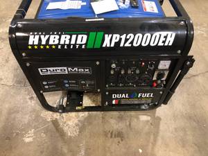 lot 10 image: DUROMAX 120009500-Watt Dual Fuel Electric Start GasolinePropane Portable Home Power Back Up Generator with CO Alert Sensor  Customer Returns See Pictures