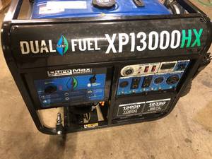 lot 26 image: DUROMAX 1300010500-Watt Dual Fuel Electric Start GasolinePropane Portable Home Power Back Up Generator with CO Alert Shutdown   Customer Returns See Pictures