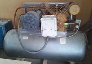 lot 466 image: Reliance Air Compressor. see pictures for more detail.