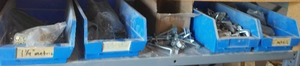 lot 799 image: Zine Corners, Countertop Bolts, And Bins.
