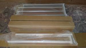 lot 830 image: In Cabinet Slide Out Towel Bars.
