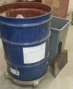 lot 845 image: 55-Gallon Steel Drum On Rollers And More.