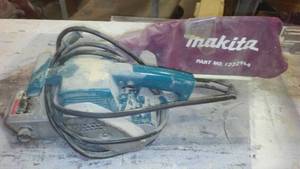 lot 897 image: Makita Belt Sander.