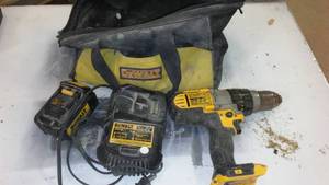 lot 957 image: DeWalt Drill With Battery Charger, Battery, And Bag.