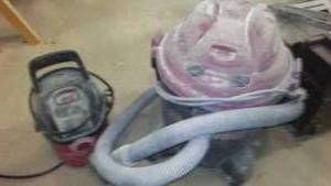 lot 979 image: Shop Vac Vacuum. 2 Hp. 5 Gallons.