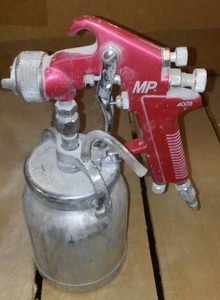 lot 1047 image: MP Spray Gun. Model# 4008.