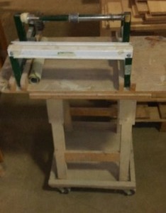 lot 529 image: Paper Holder With Cutter Teeth, On Castors.