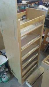 lot 557 image: Pull Out Pantry With Hardware.