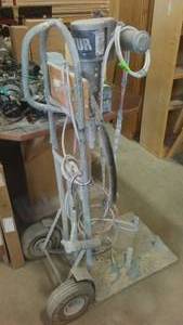 lot 583 image: Merkur Piston Pump. Standup on Wheels, Parts Only.