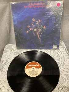 lot 8 image: Vintage Vinyl L-P Record and Jacket of the Doobie Brothers Minute By Minute Album, and a Vintage Album with Jacket of the Moody Blues