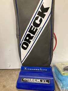lot 28 image: Oreck Commercial XL with Additional Bags (Like New)