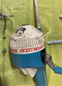 lot 38 image: Assortment of Vintage Ice Fishing Items and a 1988 Mickey Mouse Rod and Reel by Zebco, an Open Face Reel, 3-Hole Cleaners, Home Made Tip-up & More