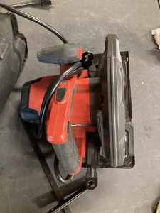 lot 60 image: Skil 7 14-inch Electric Circular Saw, Camping Axe, Roofing Hammer, Bale Hook, Claw Hammer, and More