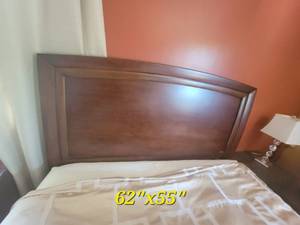 lot 64 image: Contemporry Mahogany Panel Queen bedframe
